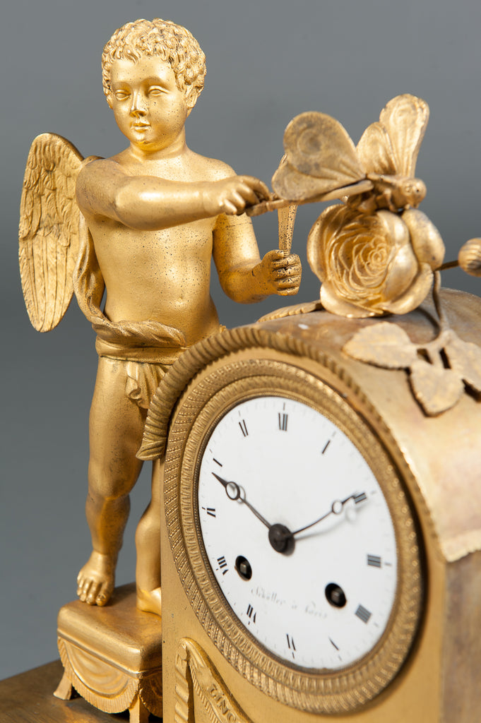 A FRENCH EMPIRE STYLE GILT BRONZE MANTEL CLOCK EARLY 19TH CENTURY