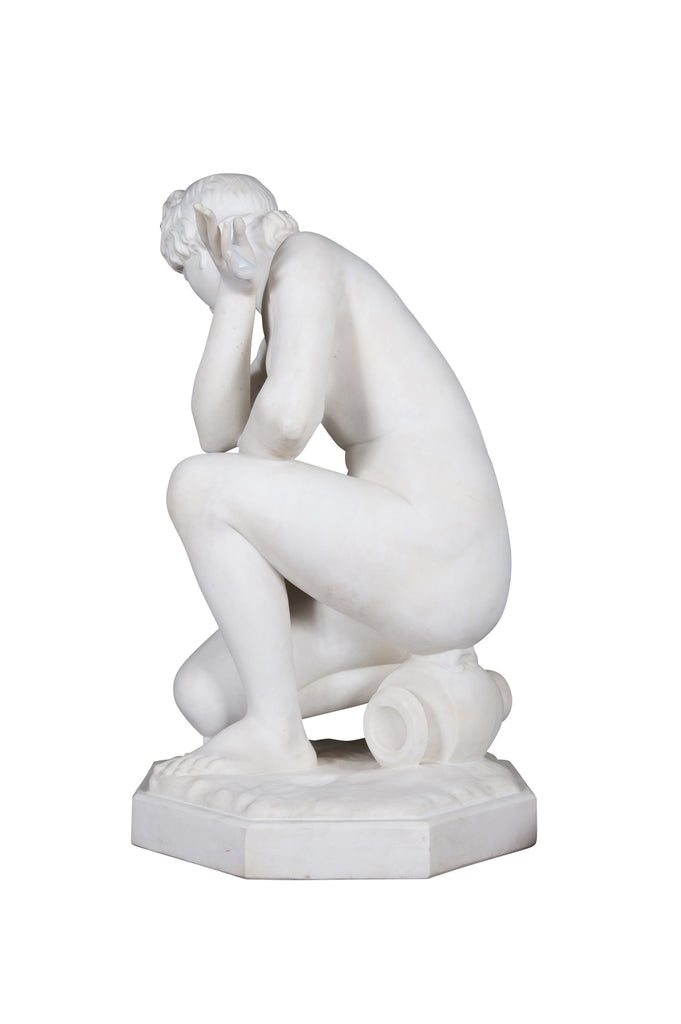 A LARGE ITALIAN CARRARA MARBLE SCULPTURE OF CROUCHING VENUS